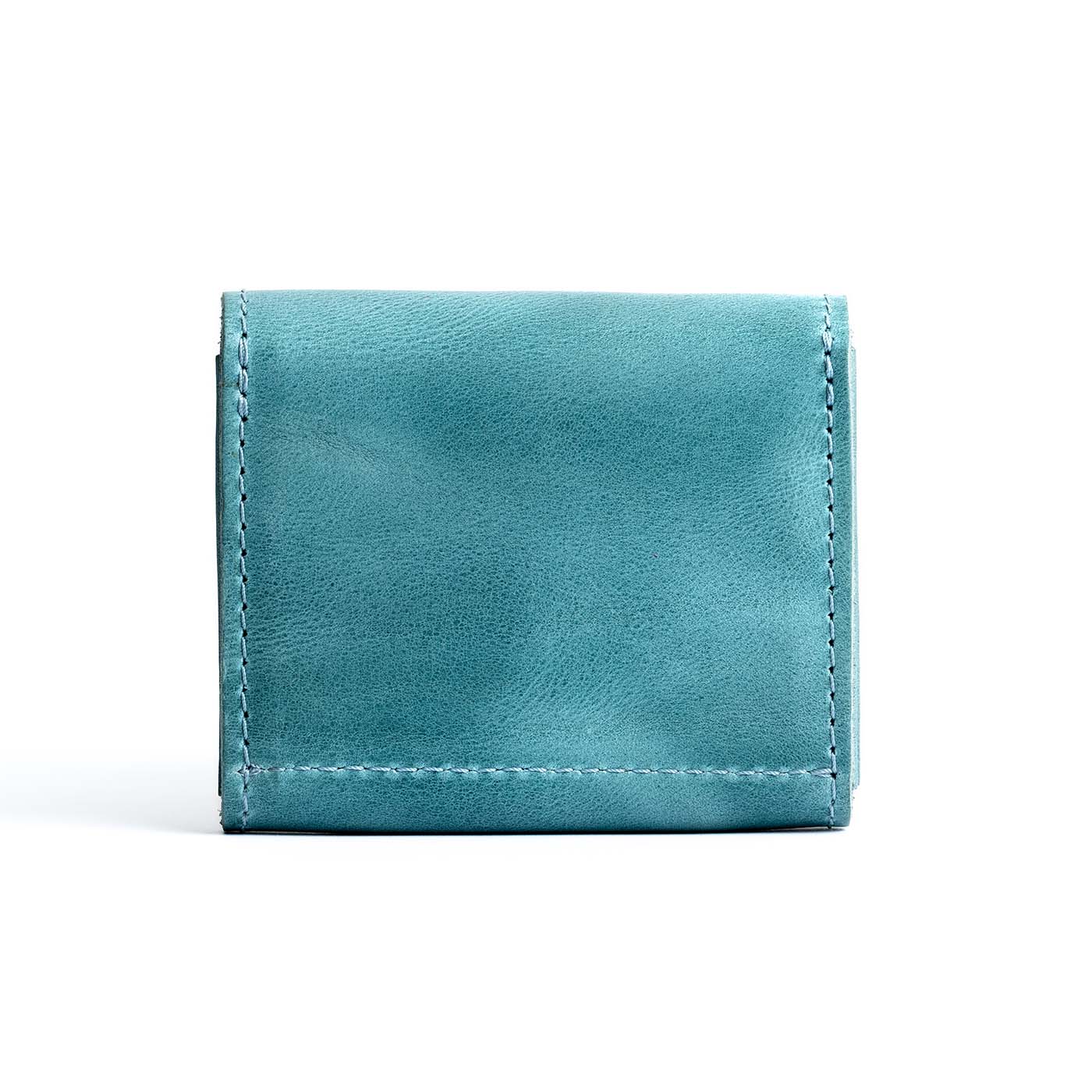 Aqua | Backside of compact leather wallet with snap closure 