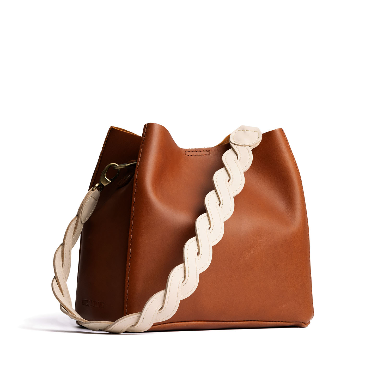 Bone | Woven leather shoulder strap with swivel lobster clasps shown on Butterfly Bucket Bag