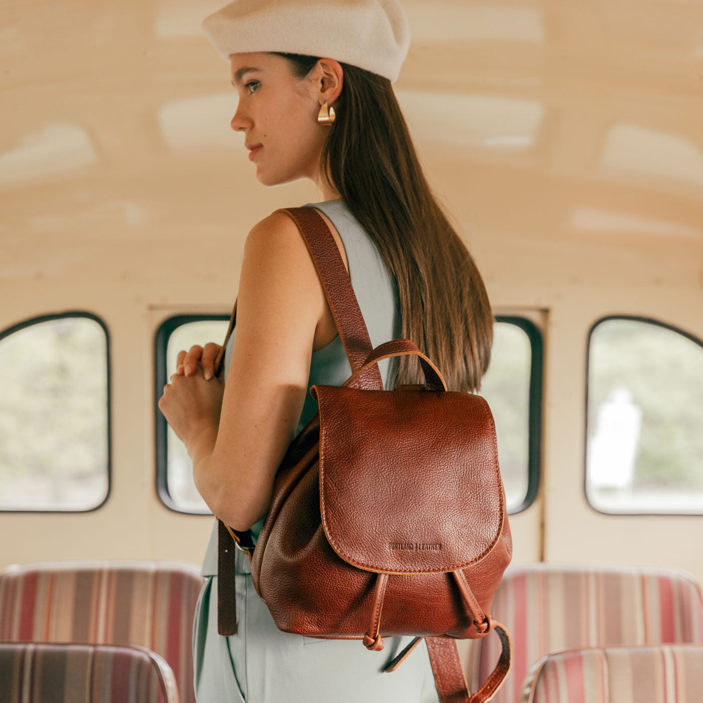 Nutmeg | Model wearing slouchy leather bucket backpack