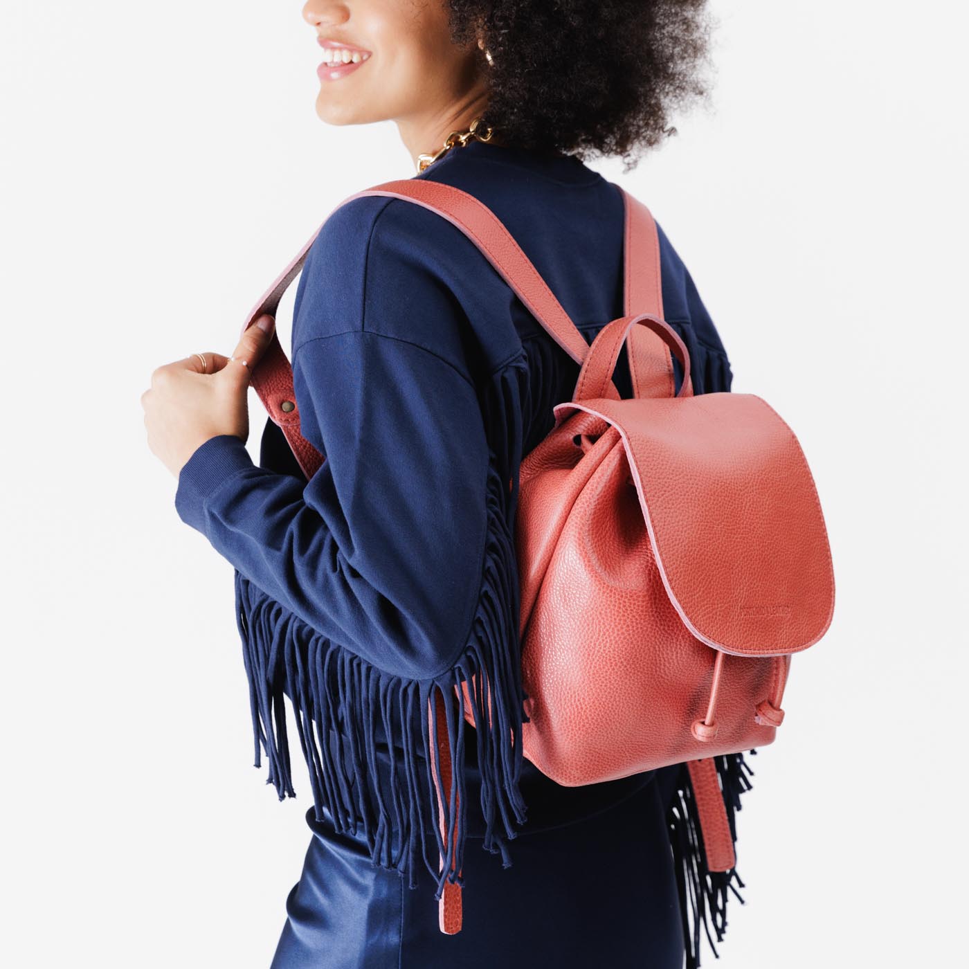 Watermelon | Model wearing slouchy leather bucket backpack