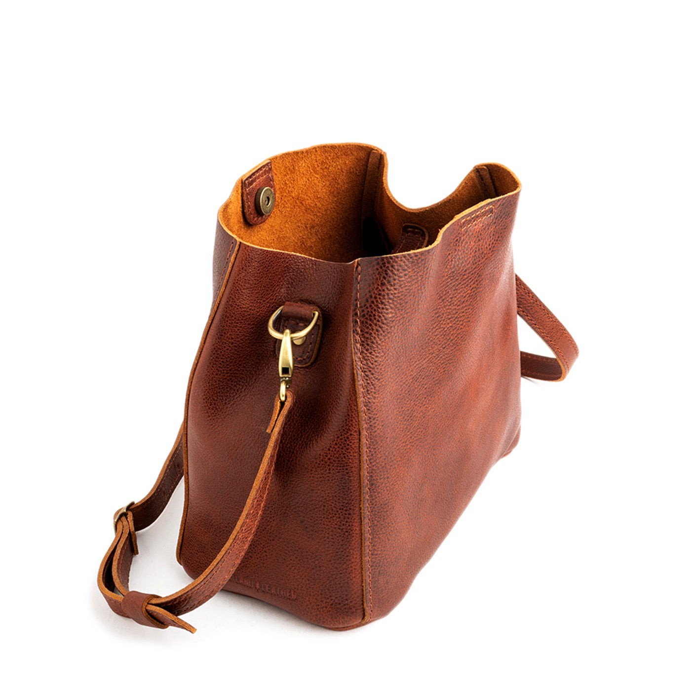 Nutmeg | symmetrical bucket bag with latch closure and removable crossbody strap