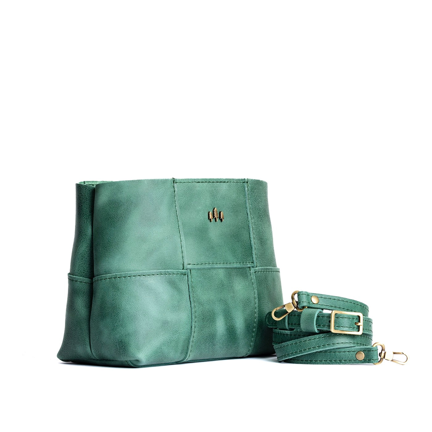 Surf Small | Structured woven leather bag with three metal tree emblems and crossbody strap