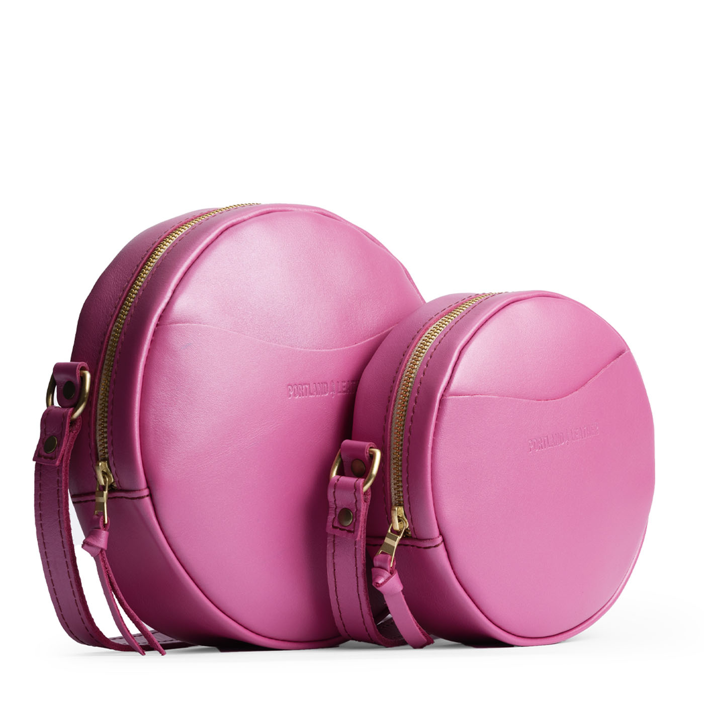 Lip Gloss | Circle shaped crossbody bag with top zipper