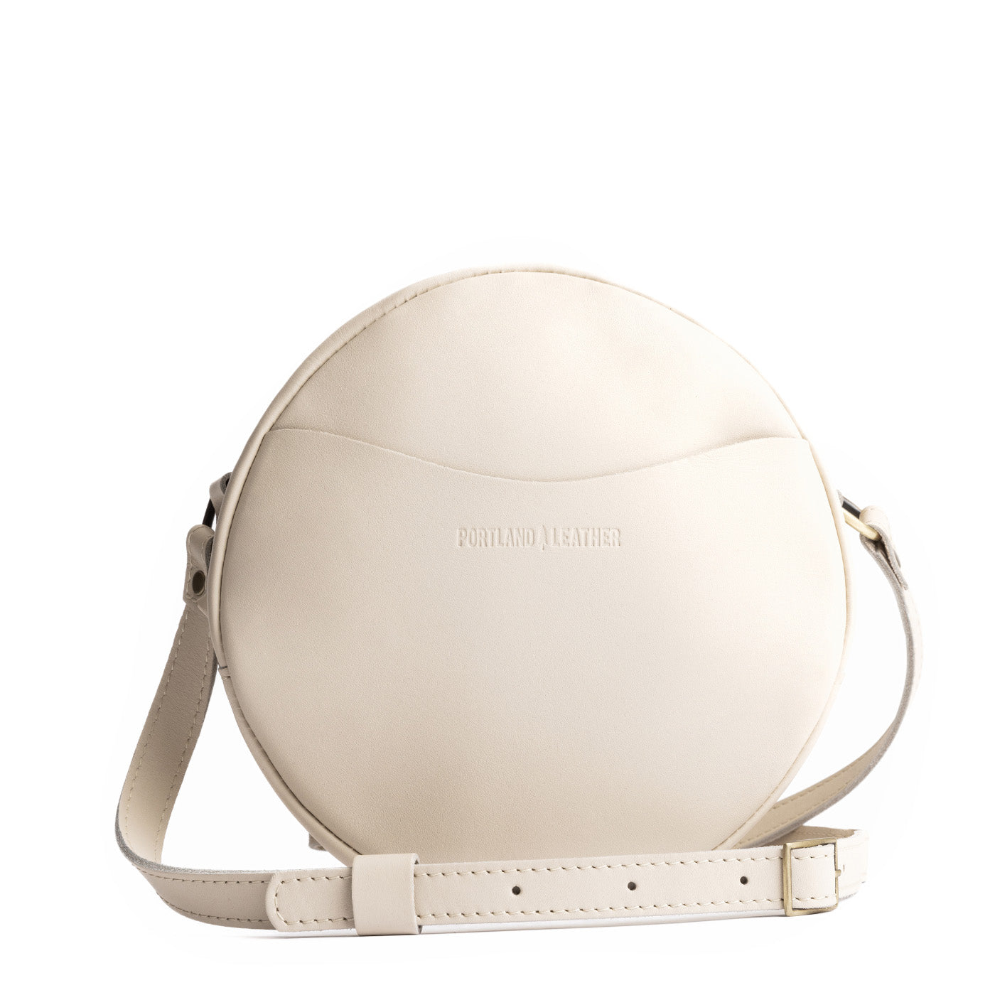 Bone Large | Circle shaped crossbody bag with top zipper