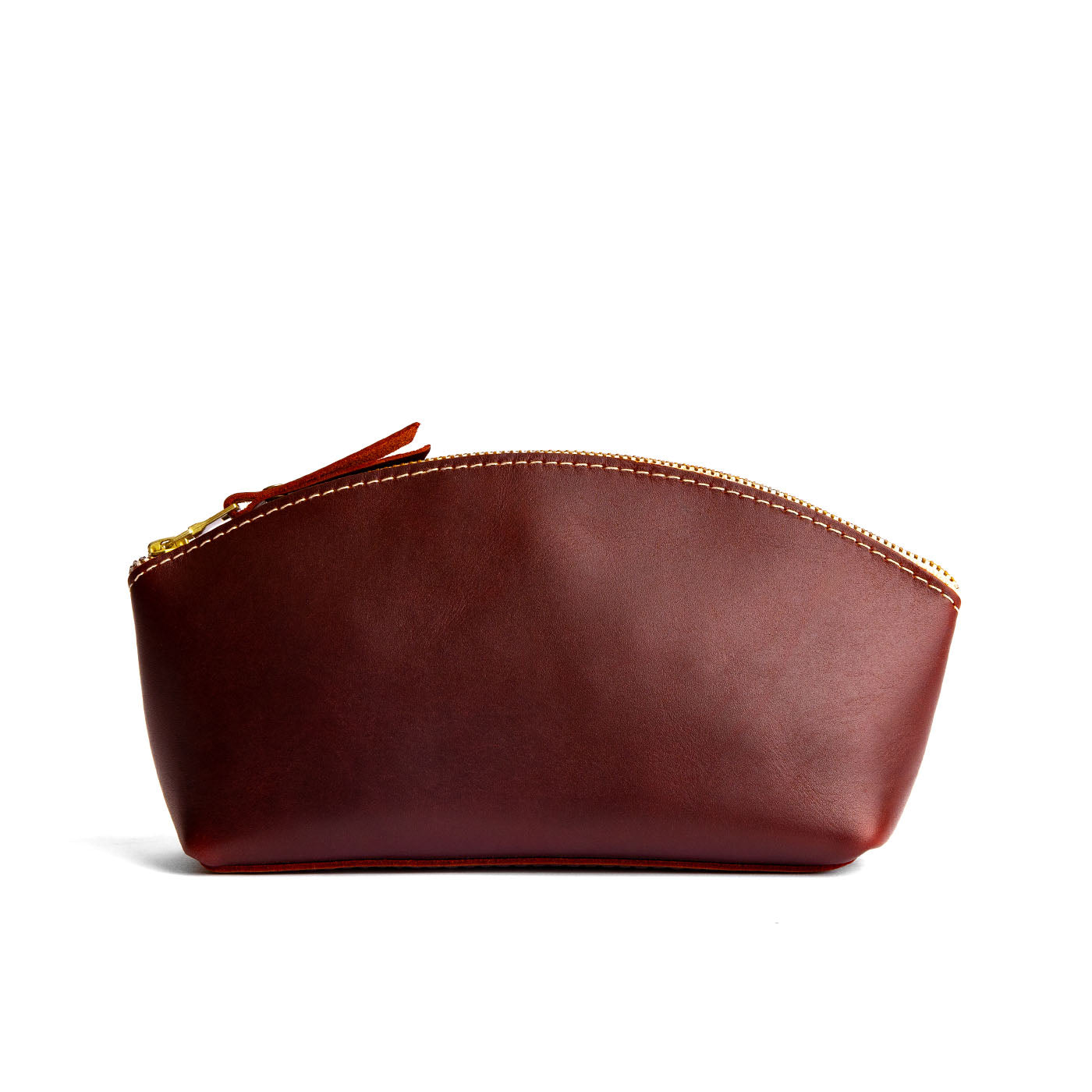 Cognac*Eclipse | Spacious leather makeup bag with curved seams and top zipper