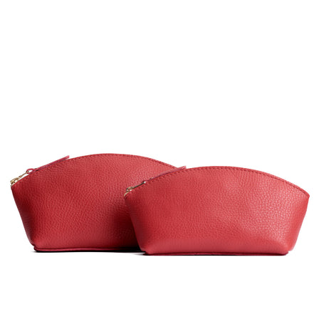 Sugar | Spacious leather makeup bag with curved seams and top zipper