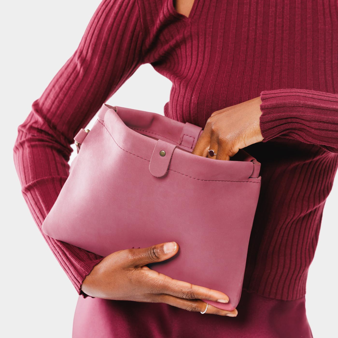 Foxglove | Model holding rectangular clutch with removable wristlet