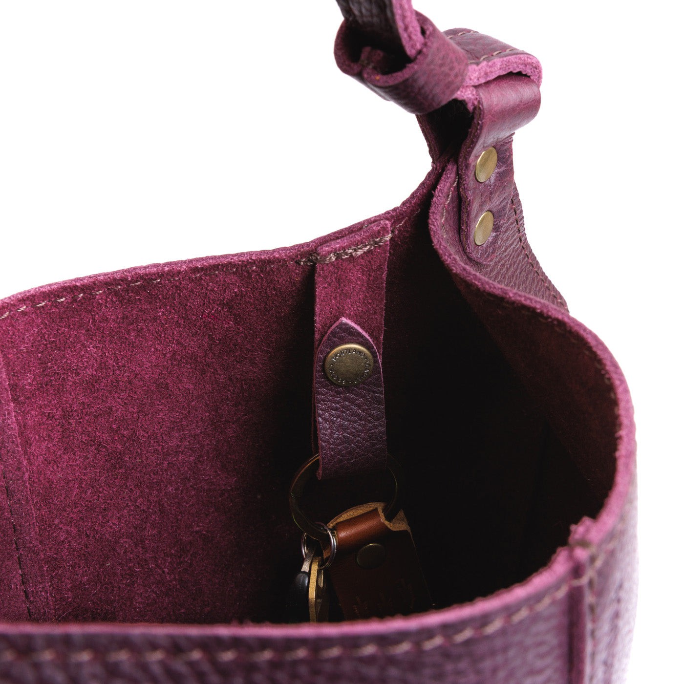 Plum | Structured bucket shaped handbag with an adjustable shoulder strap