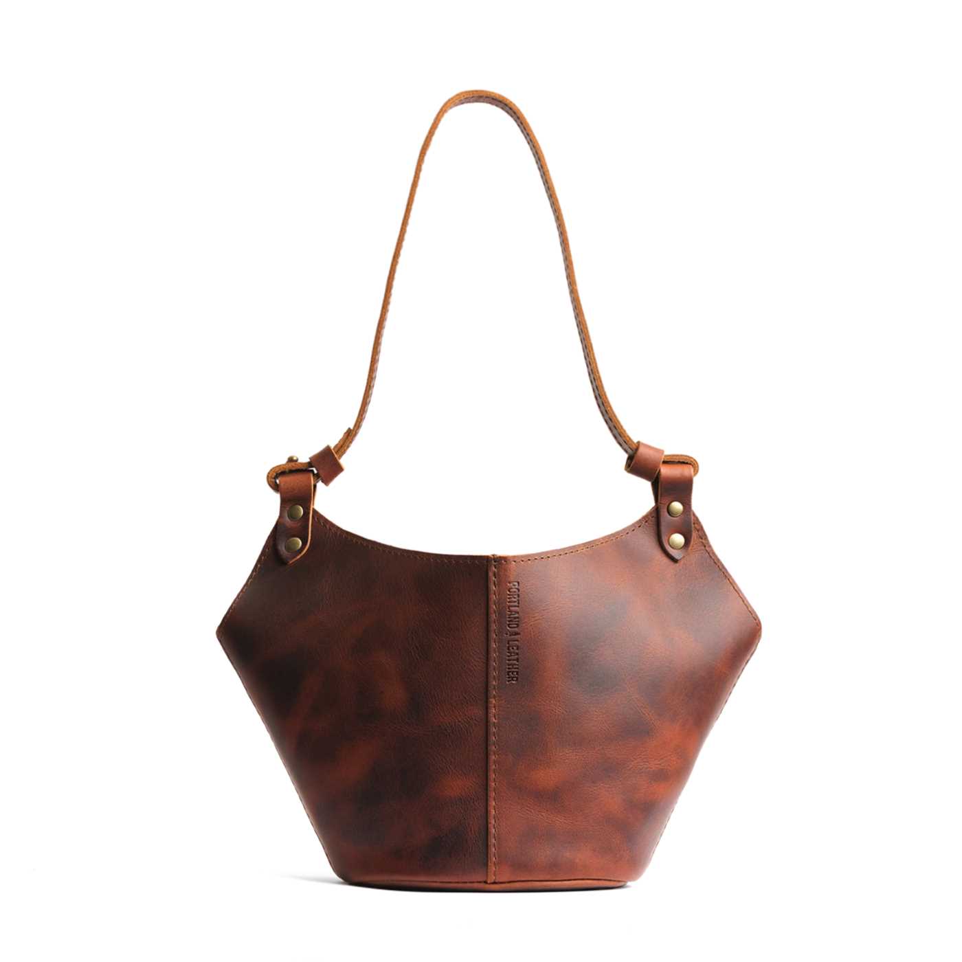 Lava Small | Structured bucket shaped handbag with an adjustable shoulder strap