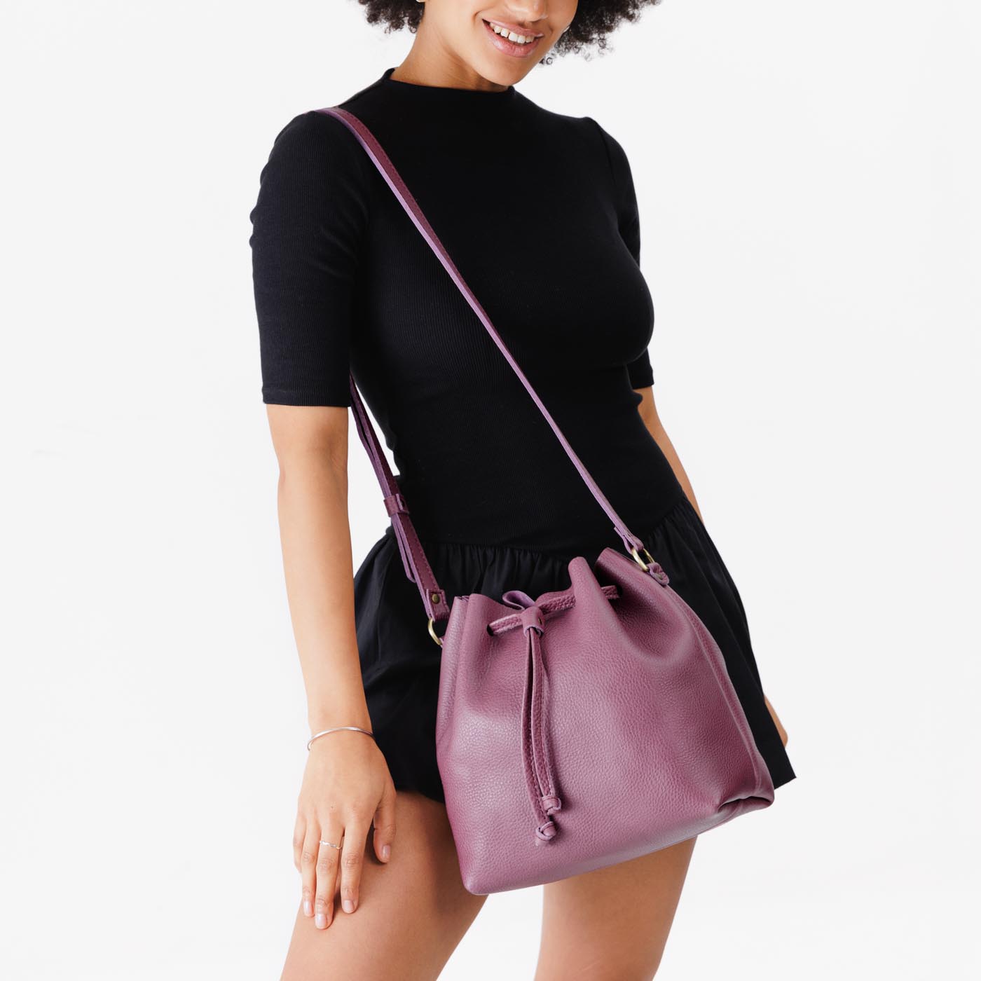 Kyoto Large | Model wearing slouchy crossbody bag with drawstring closure