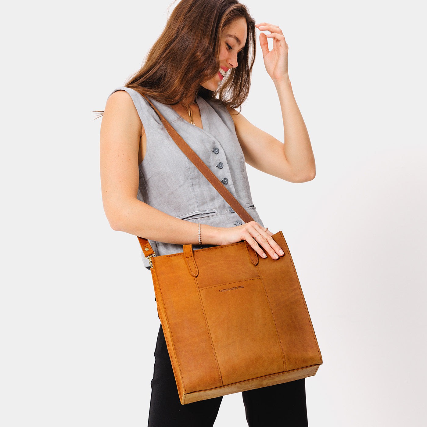  Dakota*North/South | Structured large tote bag with overlapping panels and crossbody strap