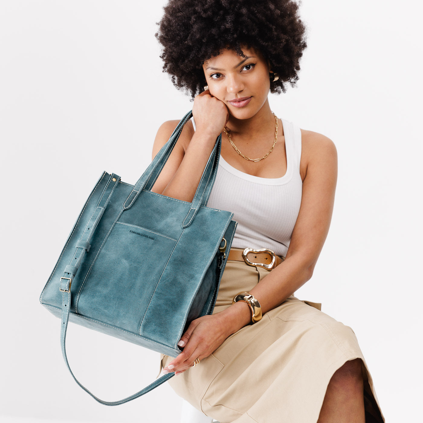  Aqua*North/South | Structured large tote bag with overlapping panels and crossbody strap