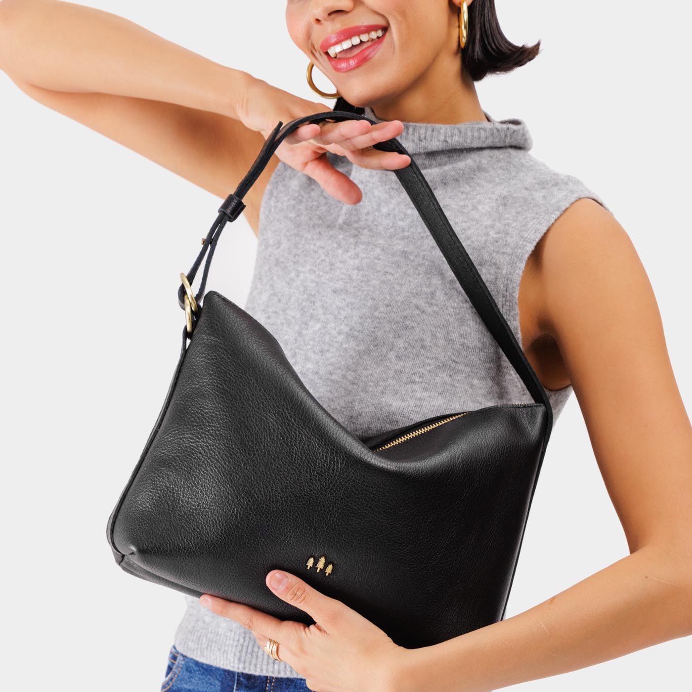 Pebbled--black*Large | Medium sized slouchy leather shoulder bag with zipper opening and three metal tree emblems