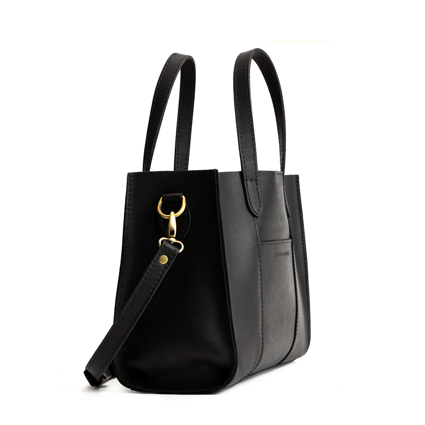 Black*Classic | Structured mid-size tote bag with overlapping panels and crossbody strap