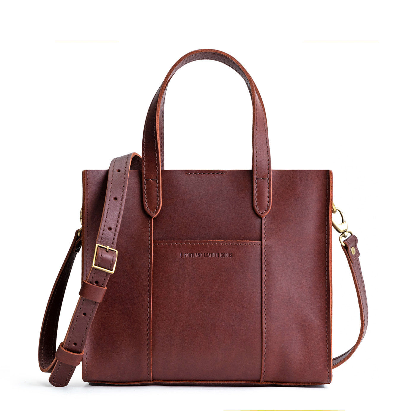 Cognac*Classic | Structured mid-size tote bag with overlapping panels and crossbody strap