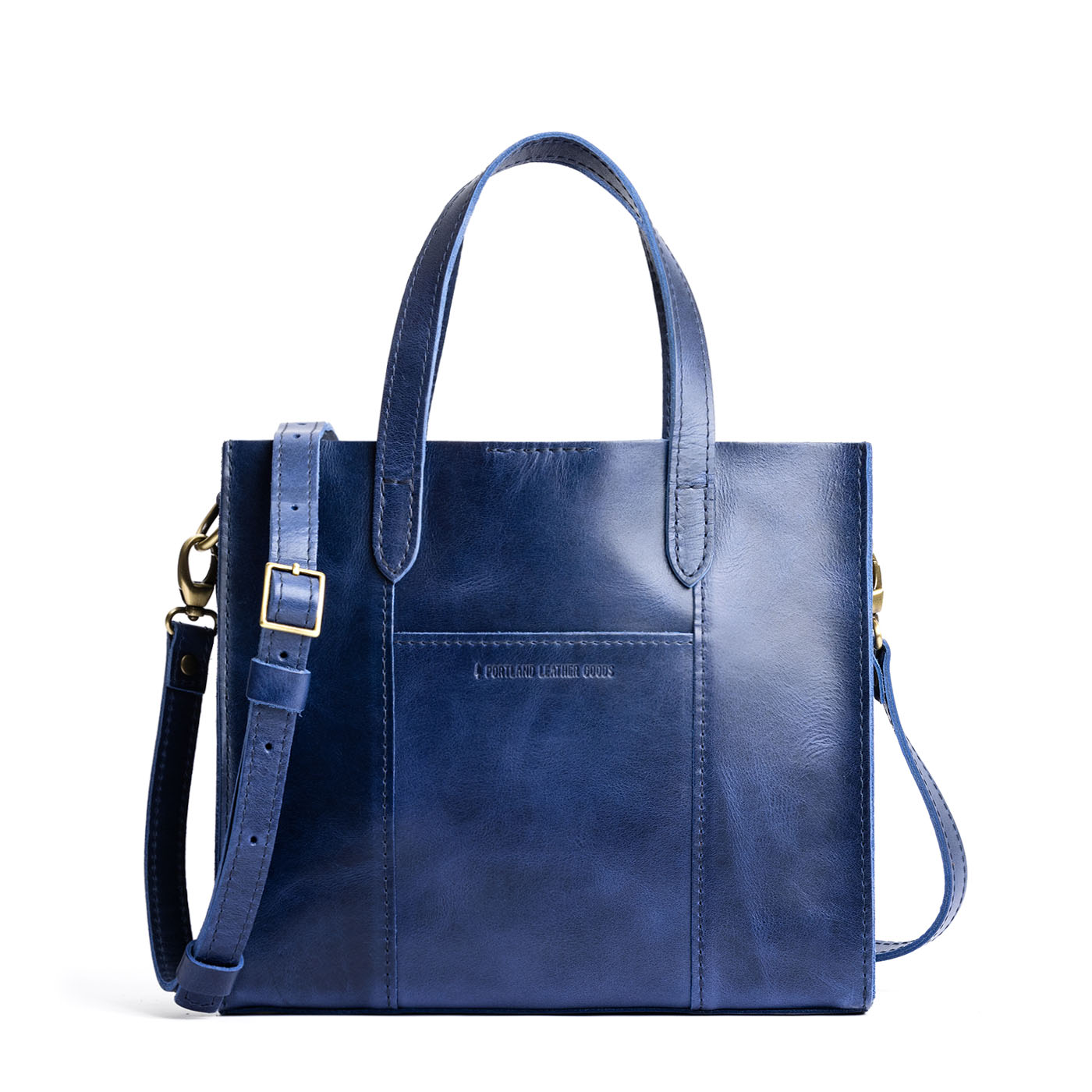 Cowboy Blue Classic | Structured mid-size tote bag with overlapping panels and crossbody strap