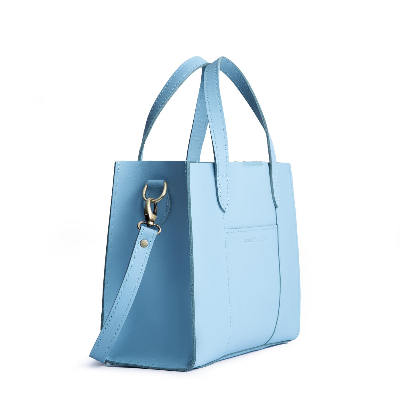 Glacial Blue | Structured mid-size tote bag with overlapping panels and crossbody strap