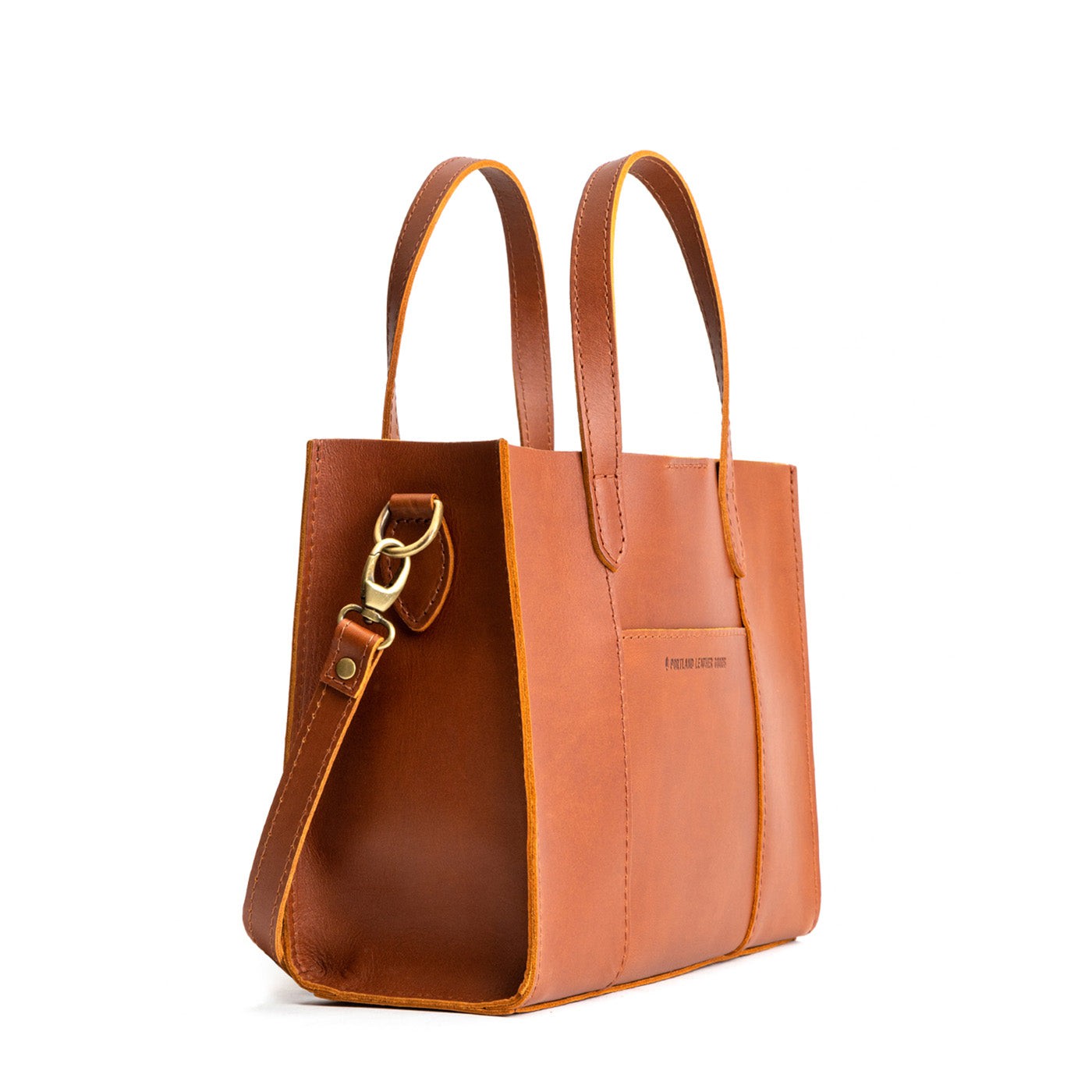 Honey*Classic | Structured mid-size tote bag with overlapping panels and crossbody strap