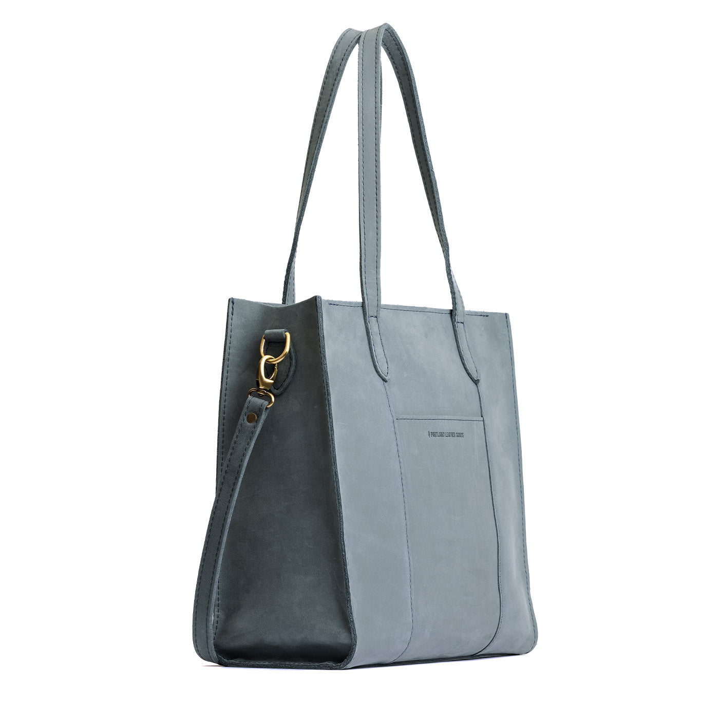 Storm*North/South | Structured large tote bag with overlapping panels and crossbody strap