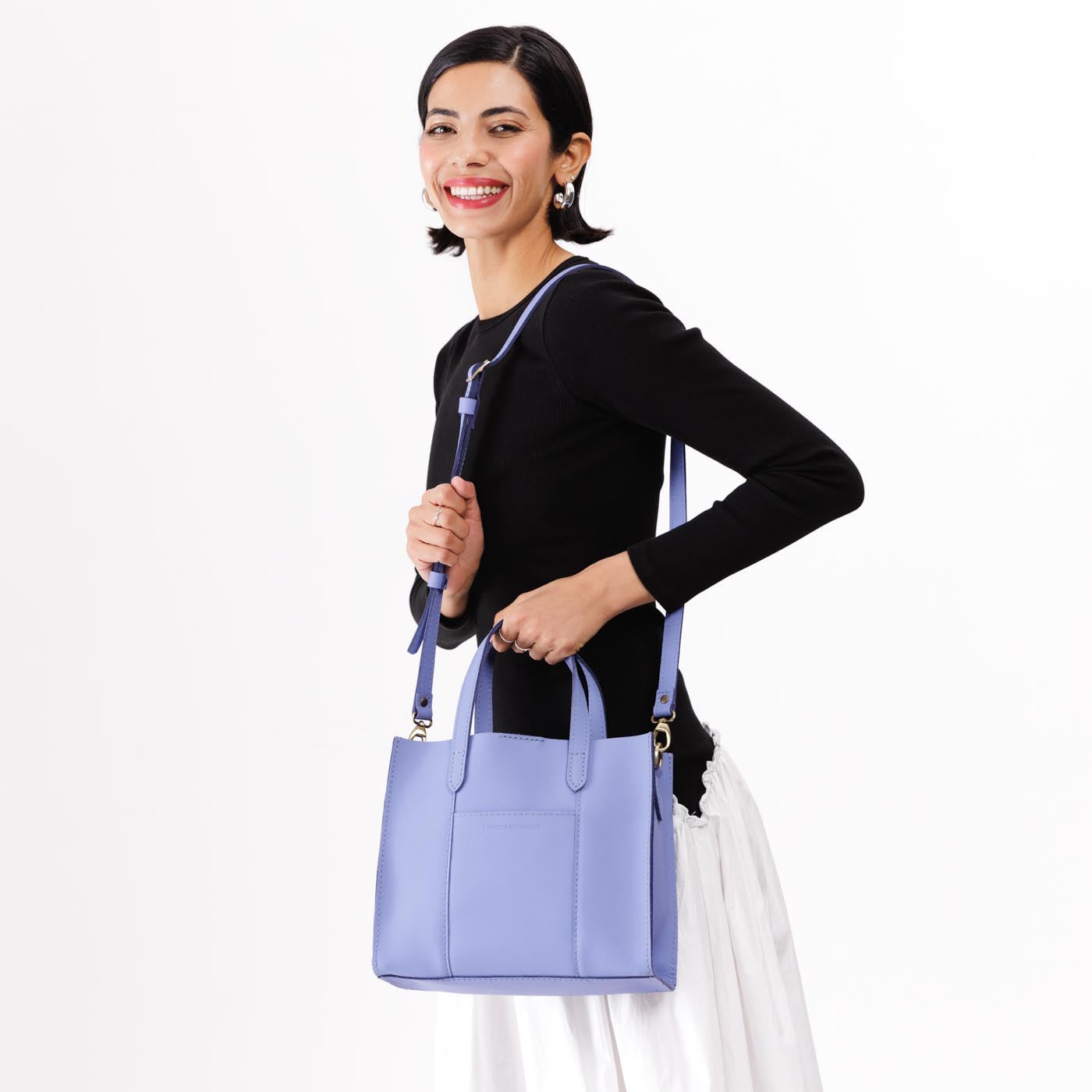 Jacaranda | Structured mid-size tote bag with overlapping panels and crossbody strap