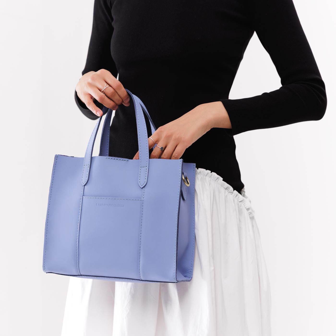 Jacaranda | Structured mid-size tote bag with overlapping panels and crossbody strap