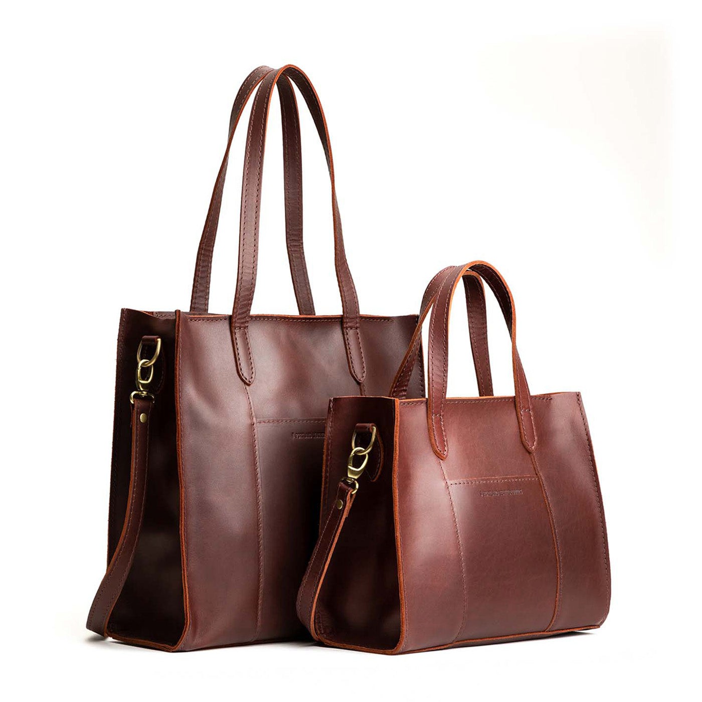 Cognac | Structured mid-size tote bag with overlapping panels and crossbody strap