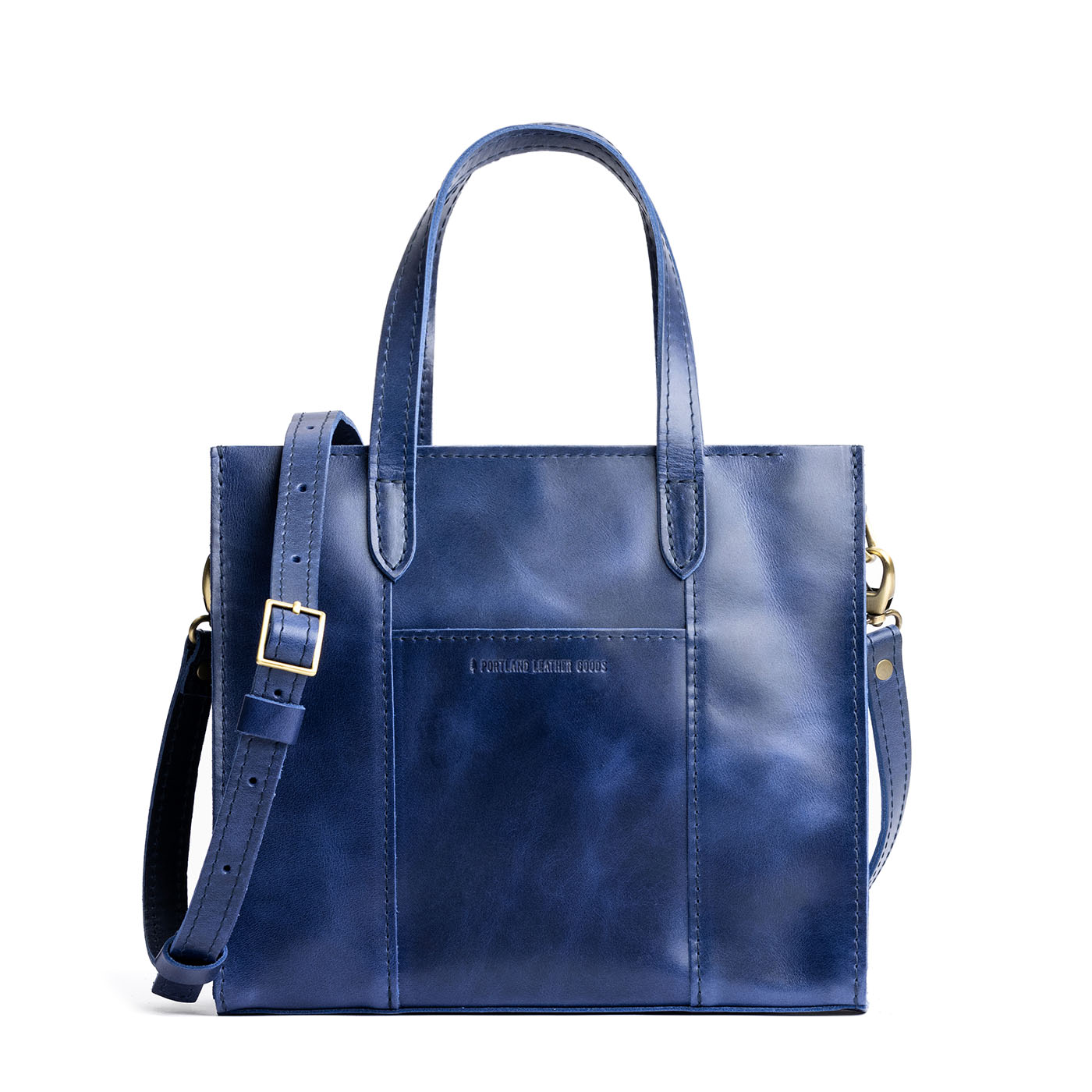 Cowboy Blue*Zipper | Structured mid-size tote bag with overlapping panels and crossbody strap