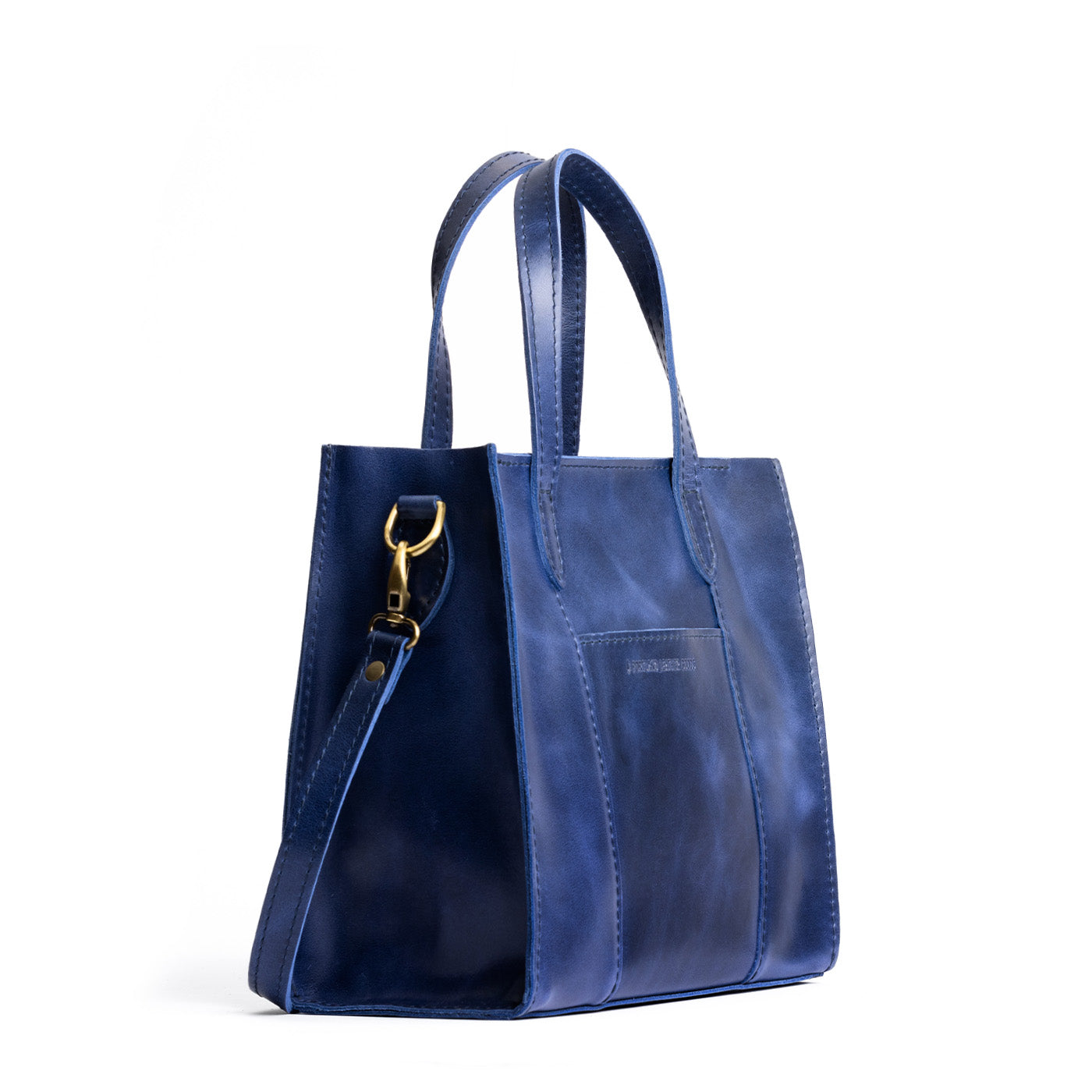 Cowboy Blue*Zipper | Structured mid-size tote bag with overlapping panels and crossbody strap