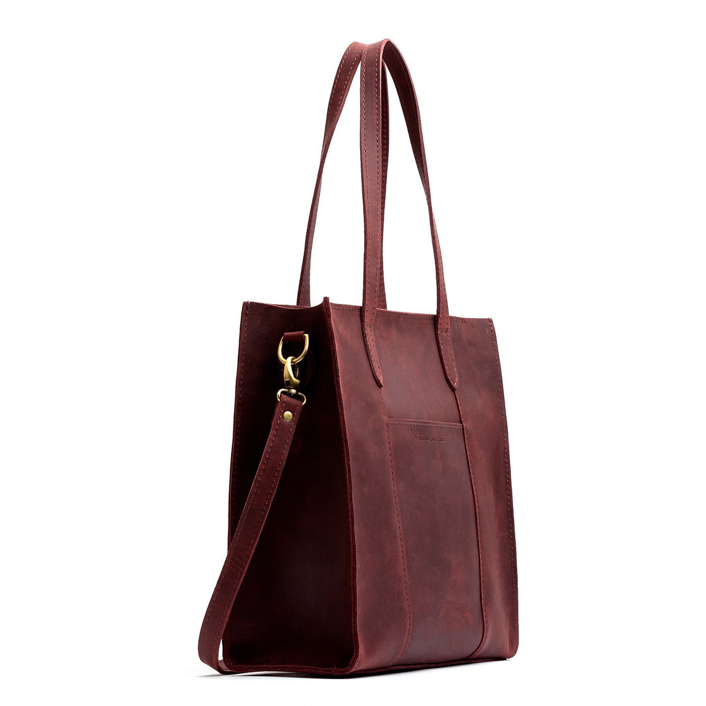  Merlot North/South | Structured large tote bag with overlapping panels and crossbody strap