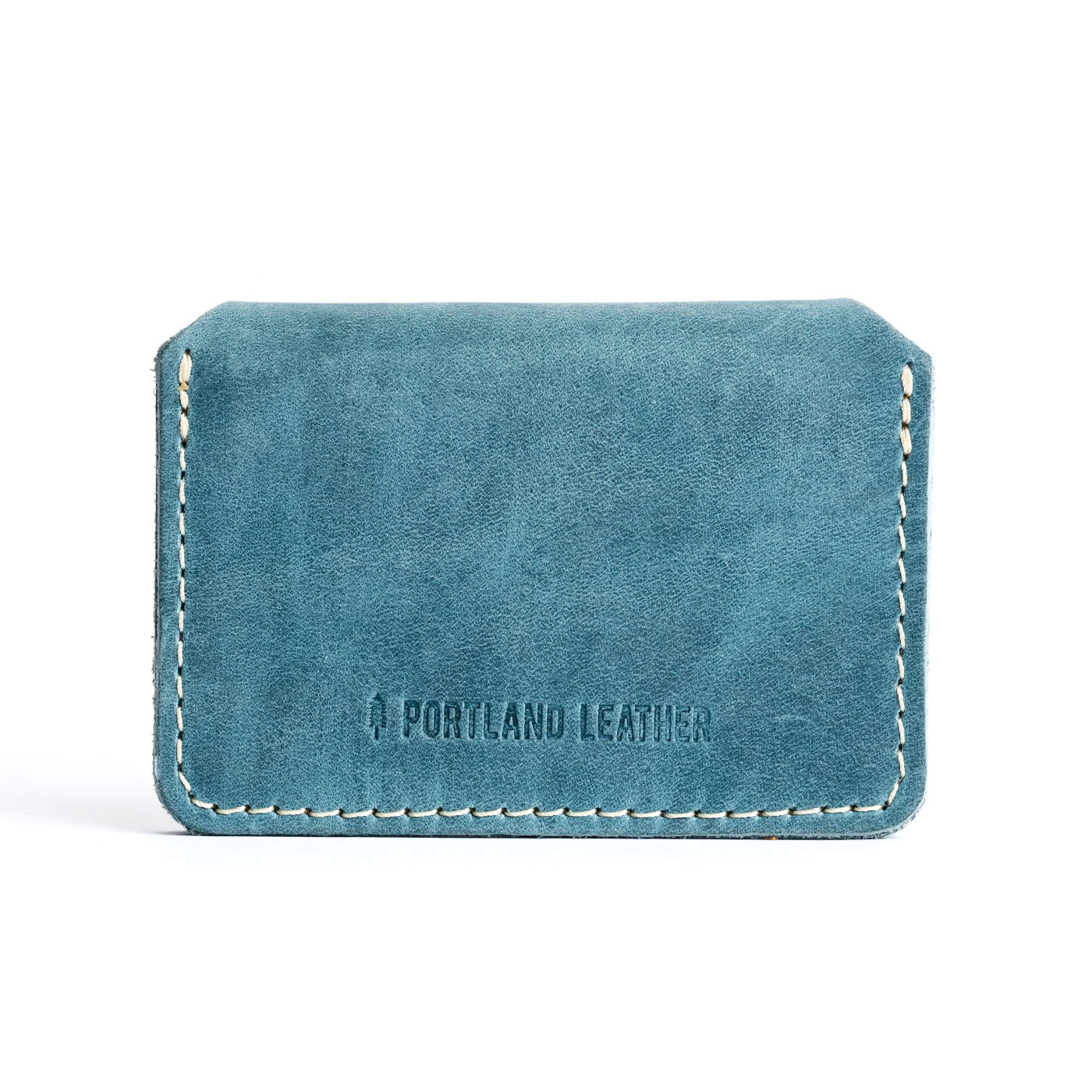 Aqua | Backside of small leather wallet with debossed PLG logo