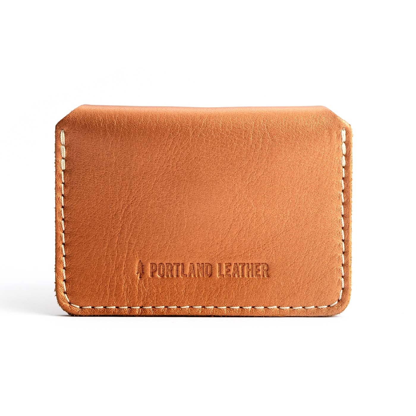 Hava | Backside of small leather wallet with debossed PLG logo