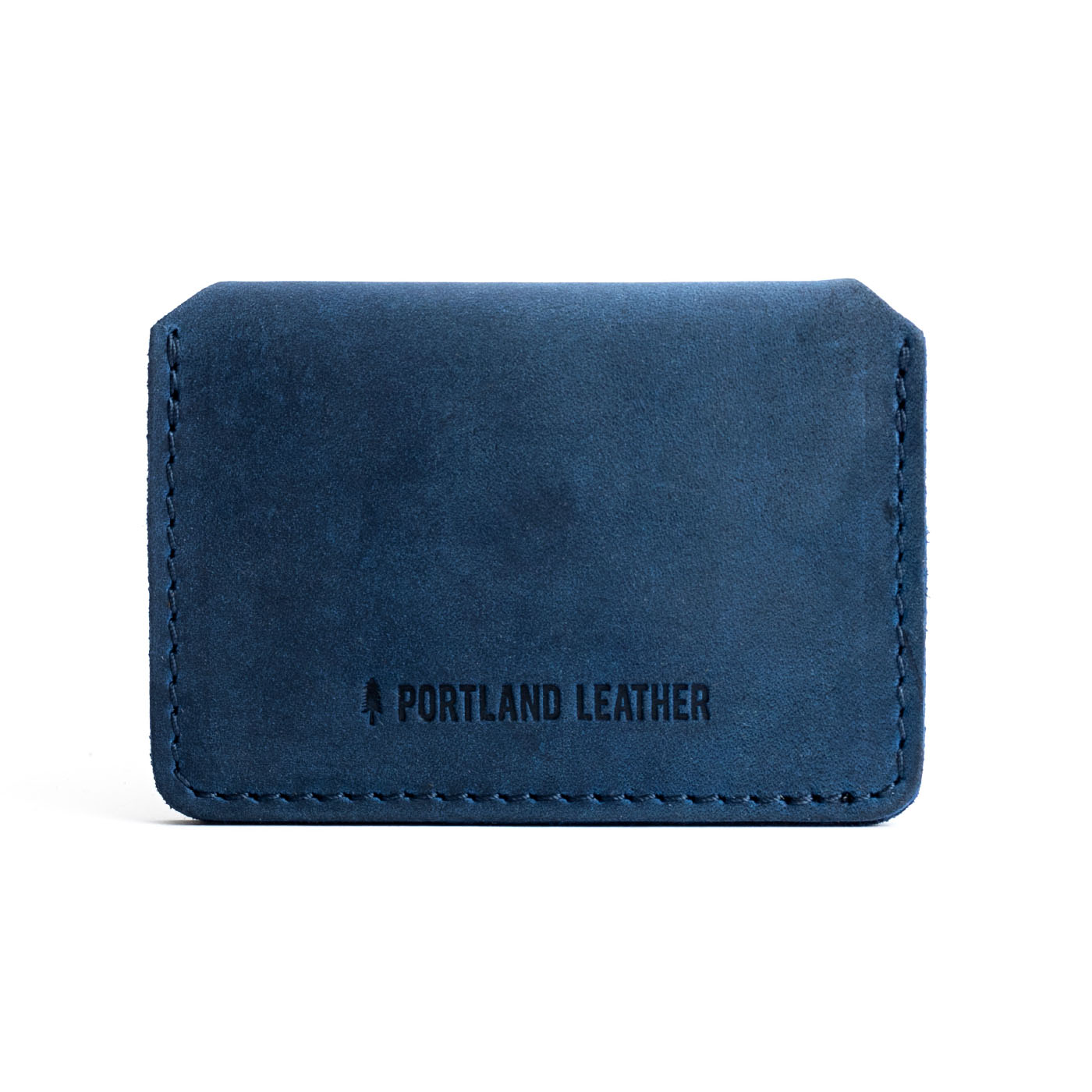 Deep Water | Backside of small leather wallet with debossed PLG logo