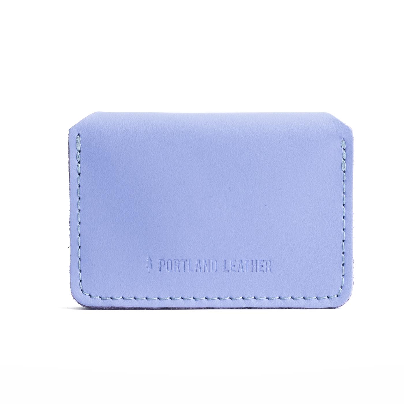 Jacaranda | Backside of small leather wallet with debossed PLG logo