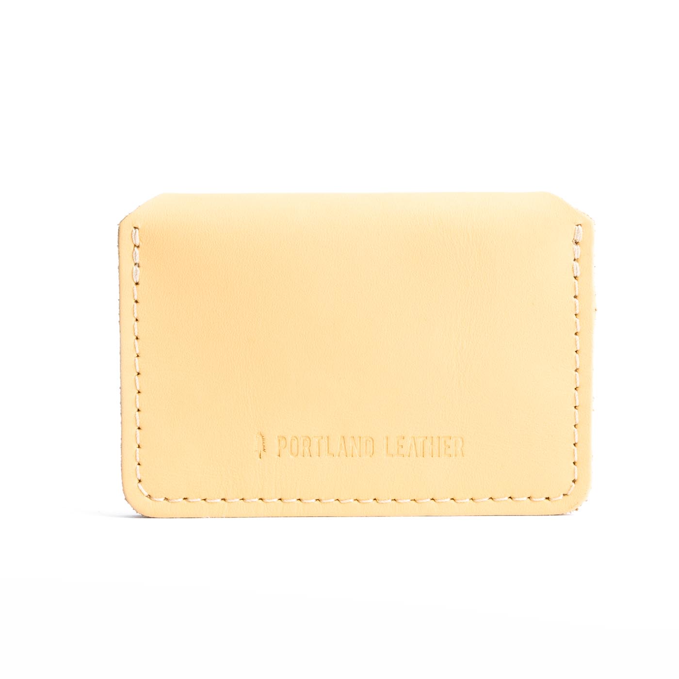 Vanilla | Backside of small leather wallet with debossed PLG logo