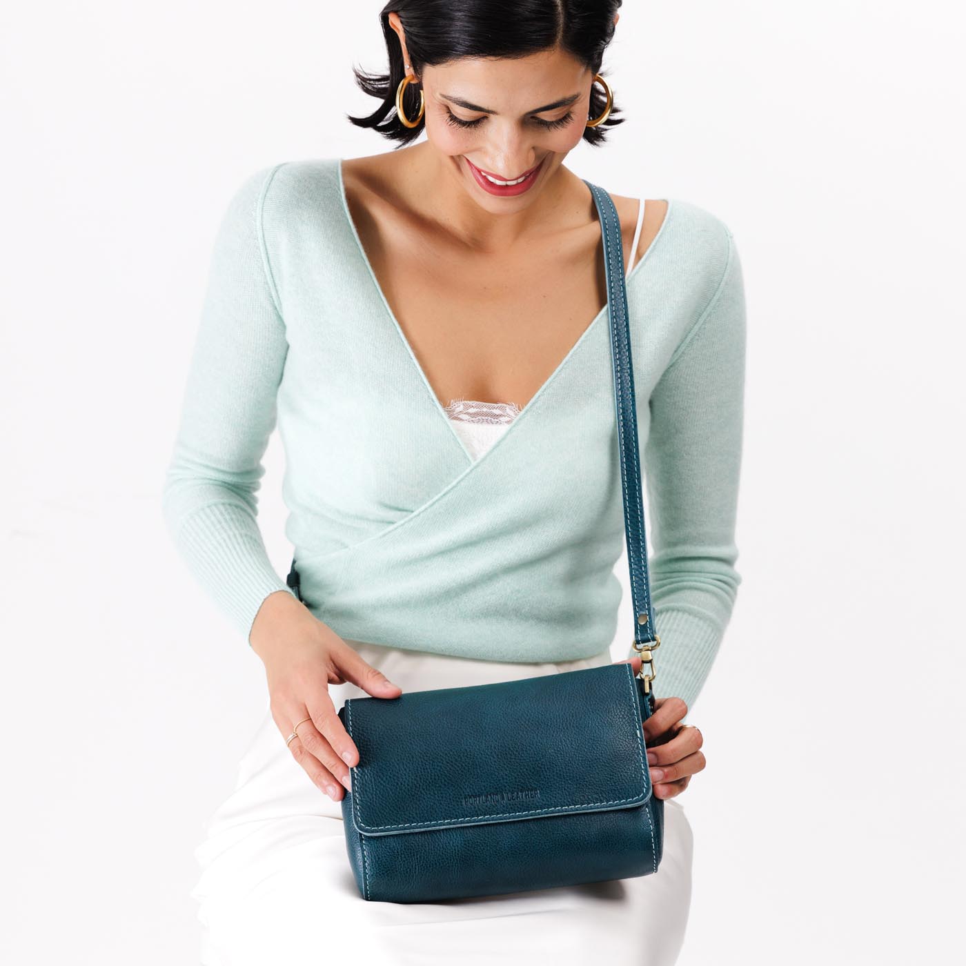 Lagoon Medium | Model wearing leather Crossbody Bag with Magnetic Messenger Bag Closure