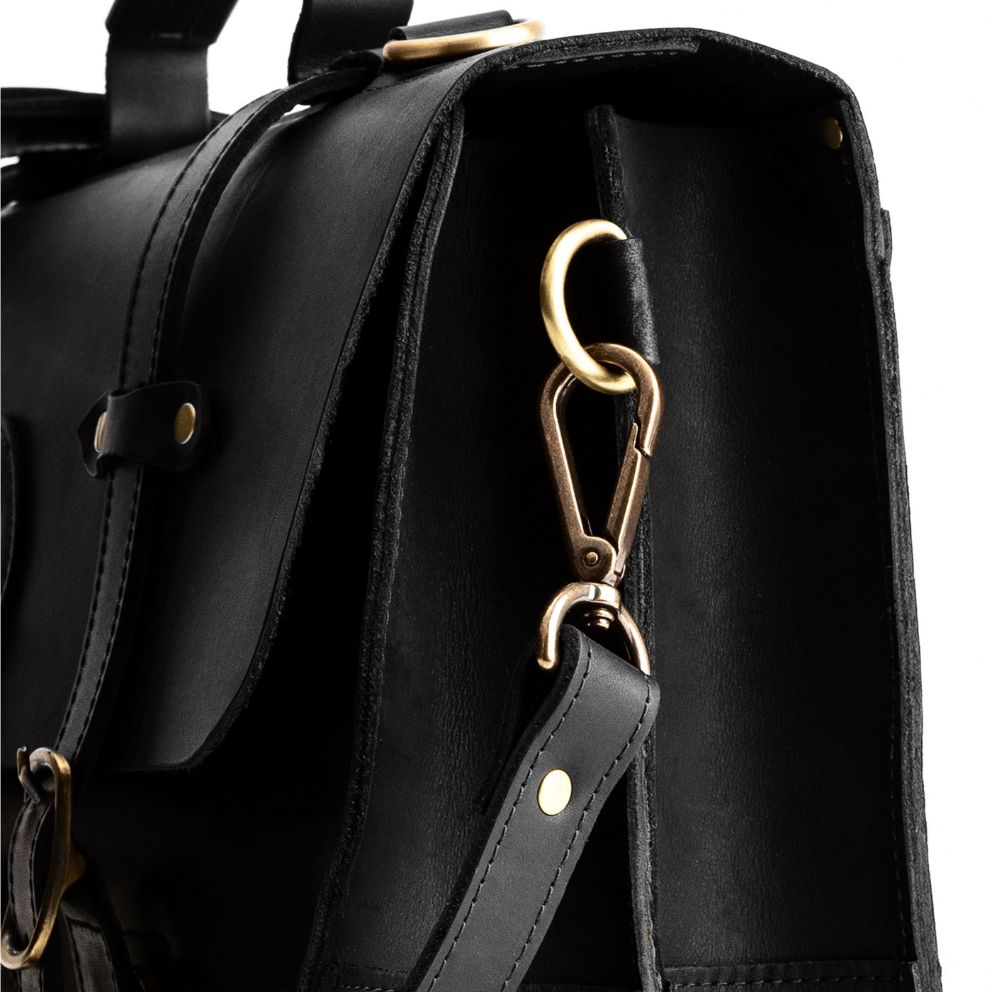 Black | Traditional messenger bag with multi buckle closure and crossbody strap