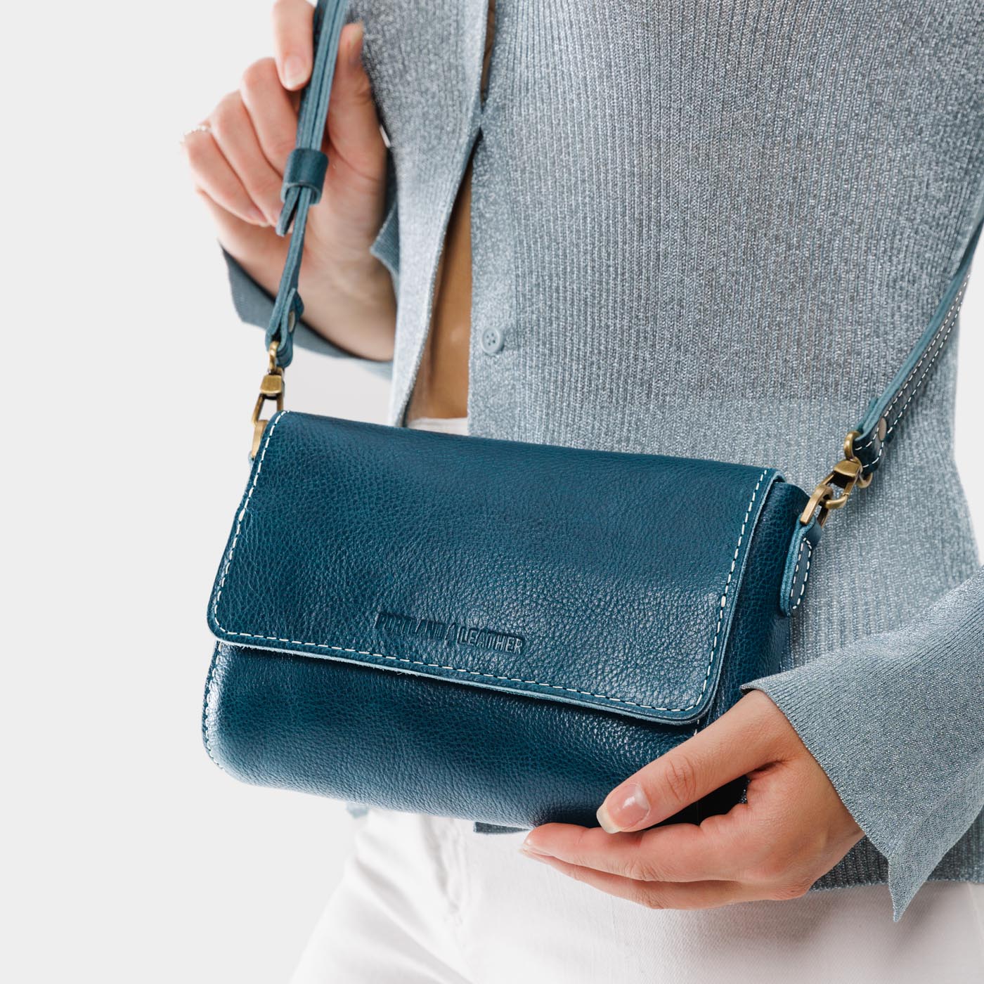 Lagoon Mini | Model wearing Small Leather Crossbody Bag with Magnetic Messenger Bag Closure