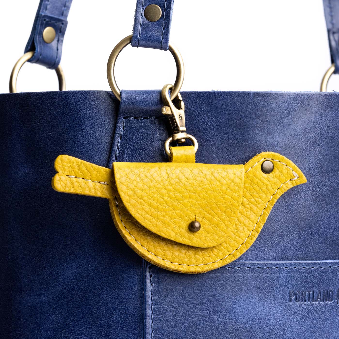 Naples | Bird shaped pouch with button closure and lobster clasp