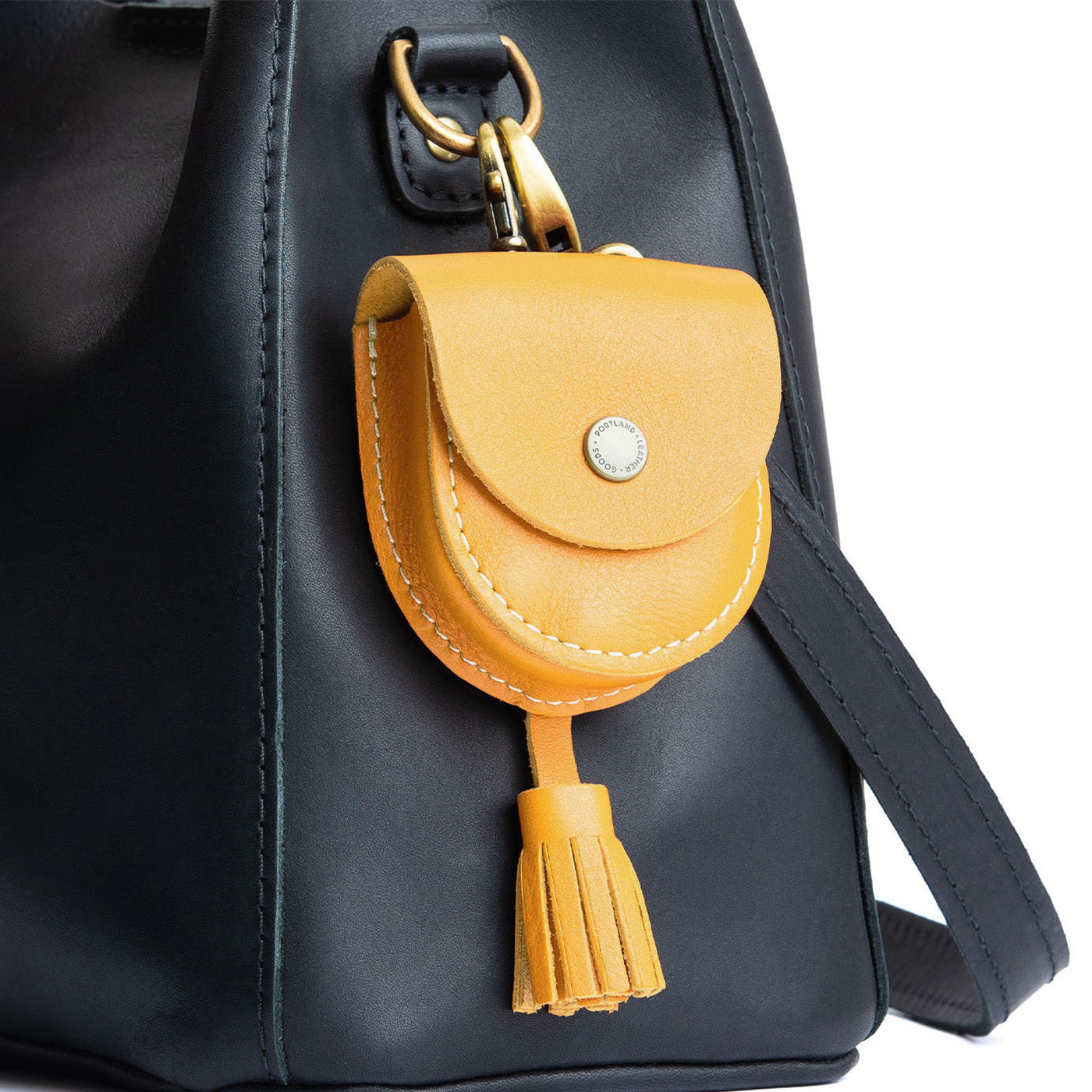 All Color: Sunflower | U shaped pouch with snap closure, lobster clasp and fringed tassel