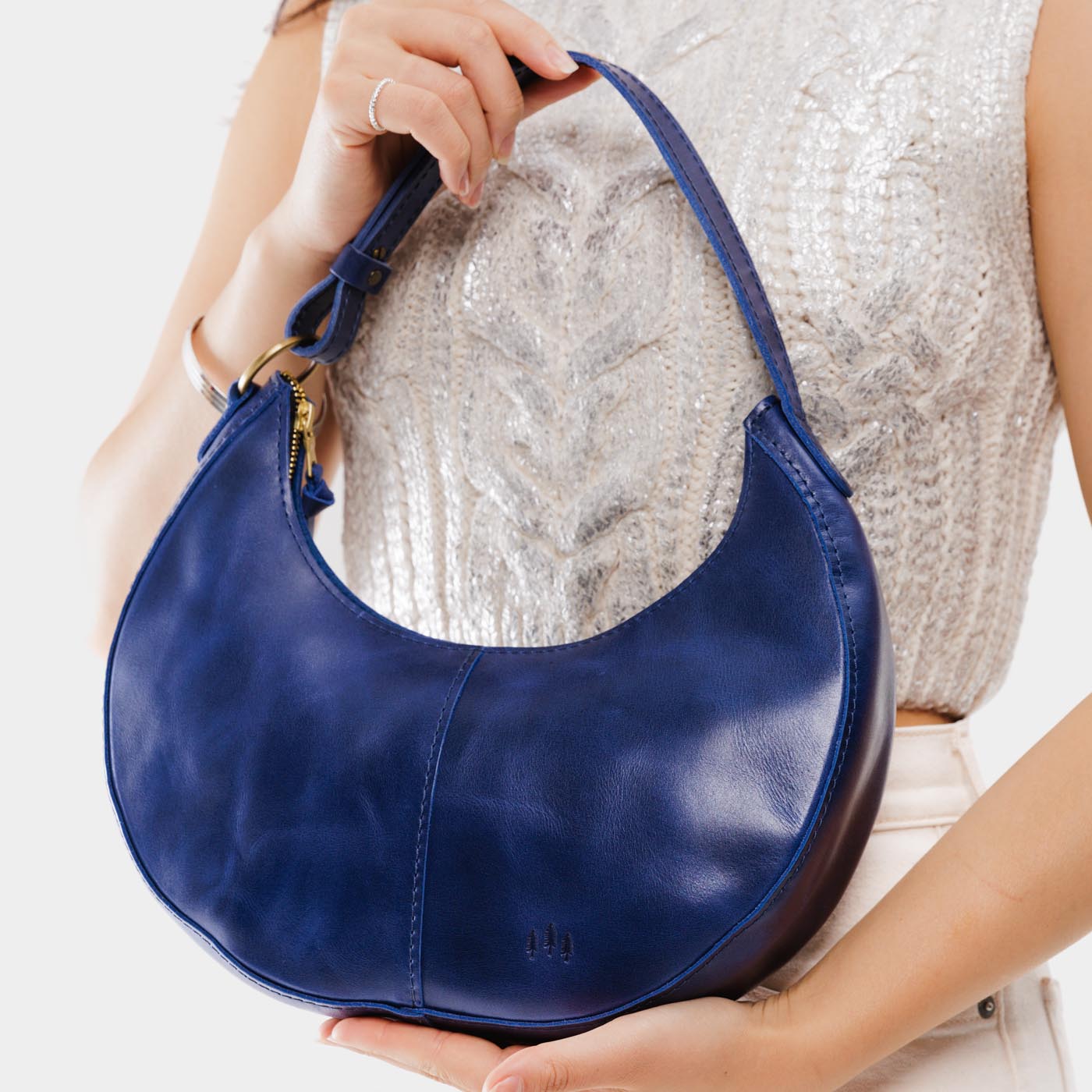 Cowboy Blue Classic | Crescent shaped shoulder bag with zipper closure and adjustable strap