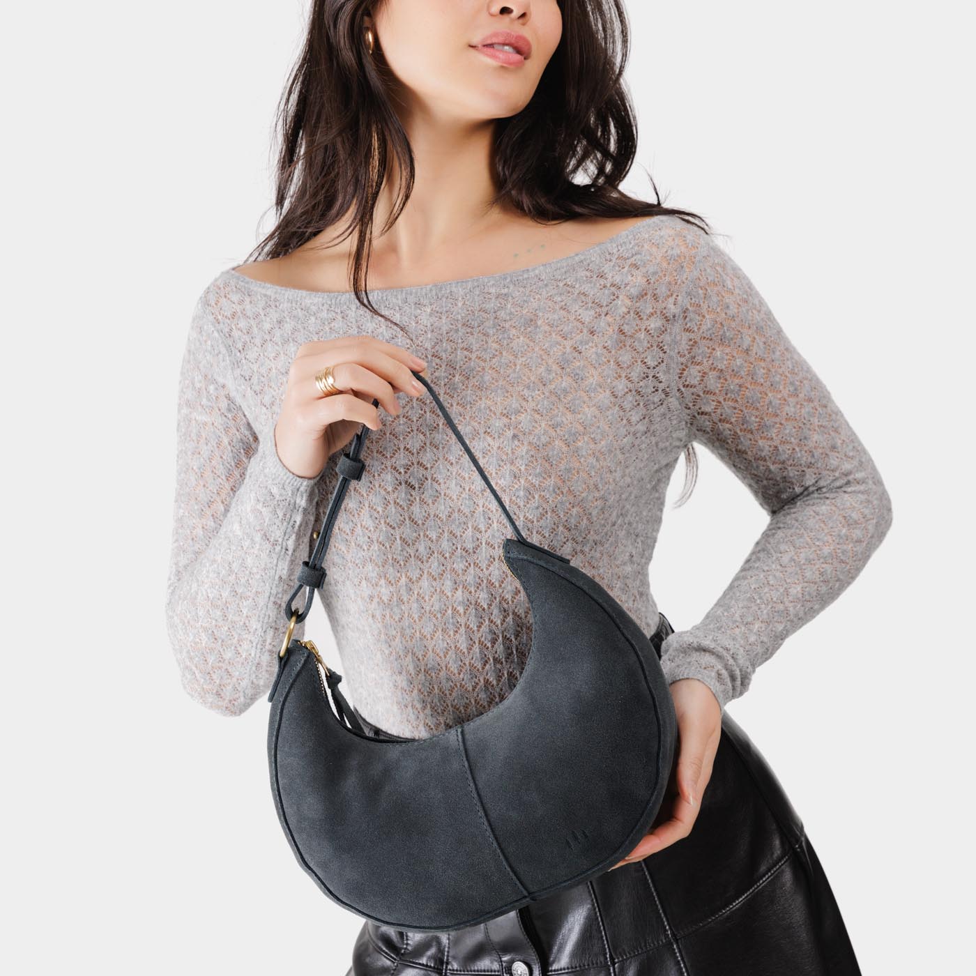 Peppercorn*Classic | Crescent shaped shoulder bag with zipper closure and adjustable strap