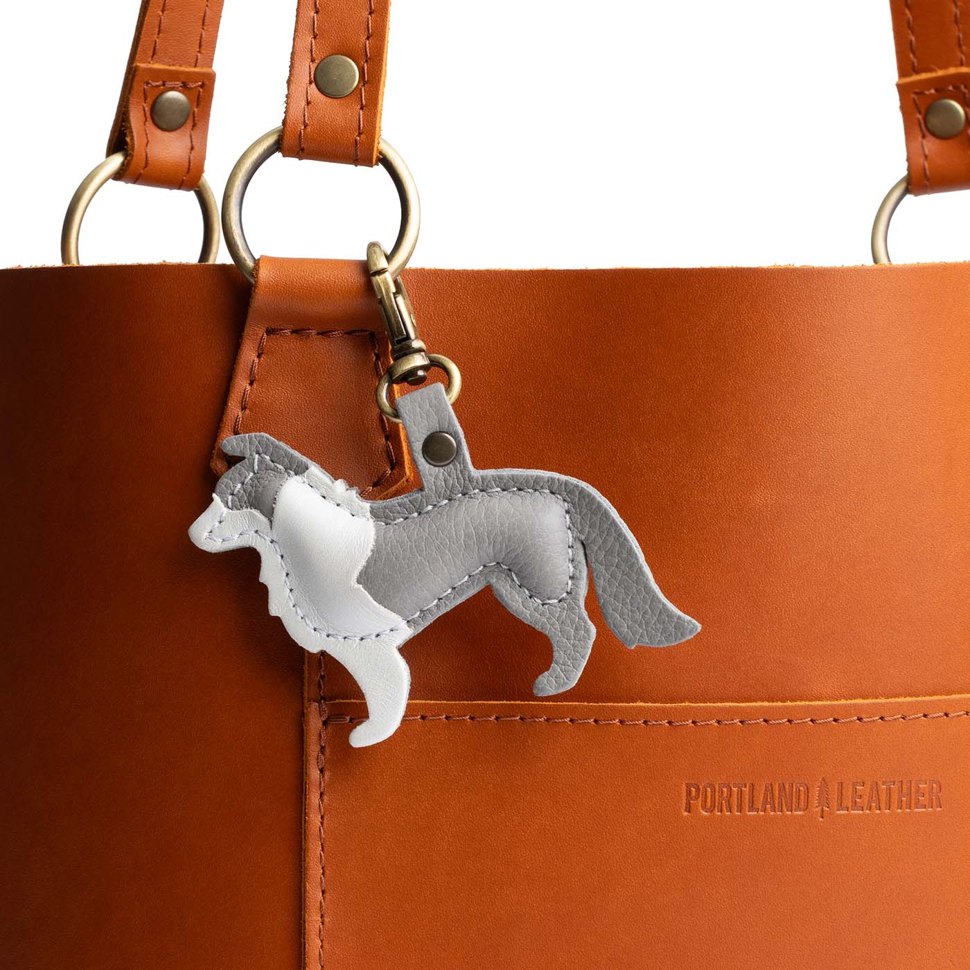 Nimbus | Leather border collie shaped keychain with metal lobster clasp