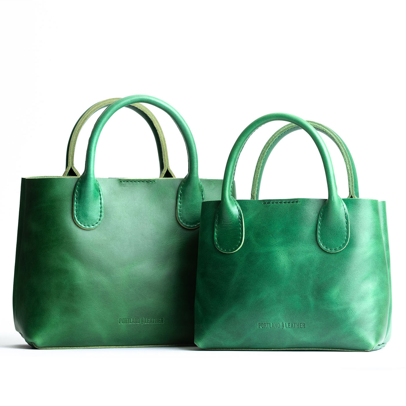 Cowboy Mint  | Side by side of both tote purses with structured leather handles and crossbody strap