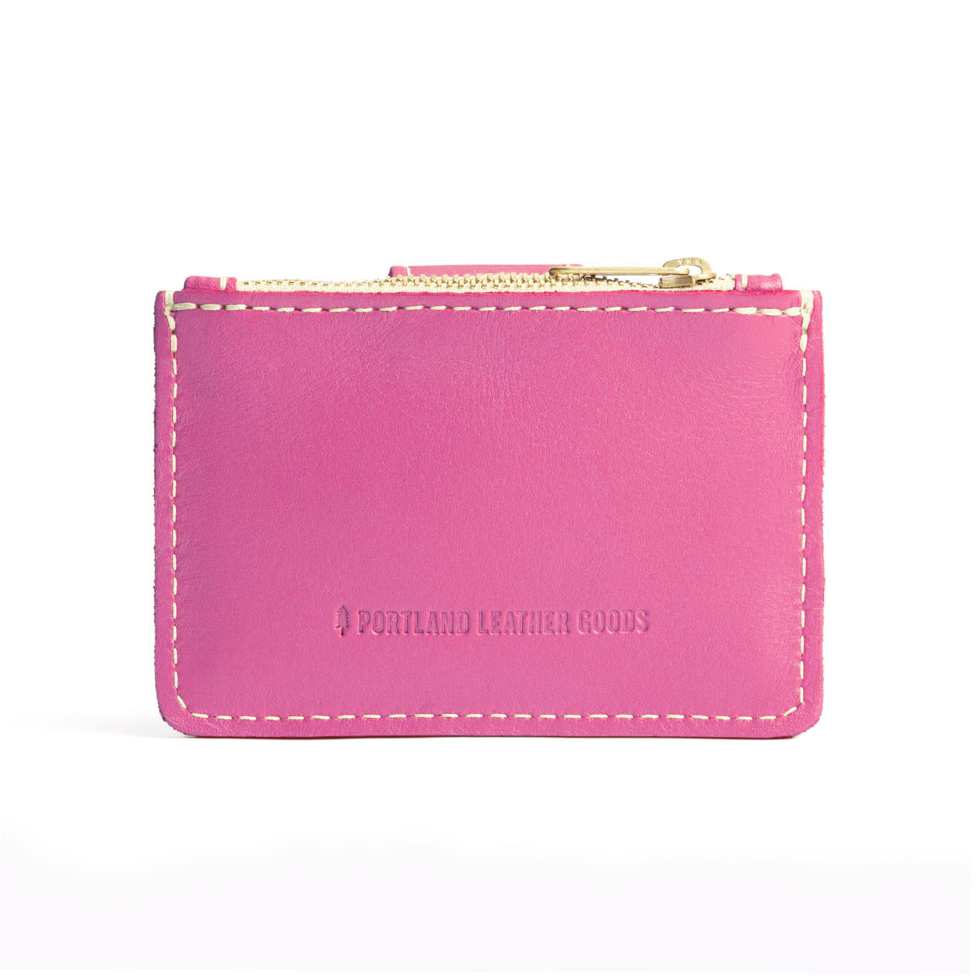 Lip Gloss | Back of compact wallet with snap closure and zippered pouch