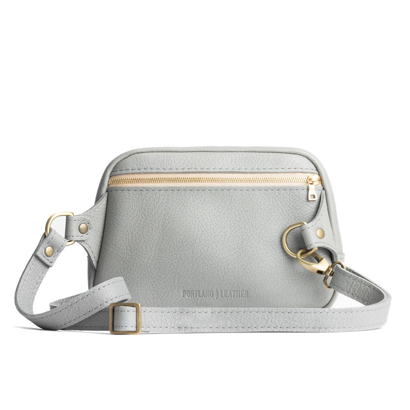 Nimbus | Back of rectangular sling bag with zipper pocket