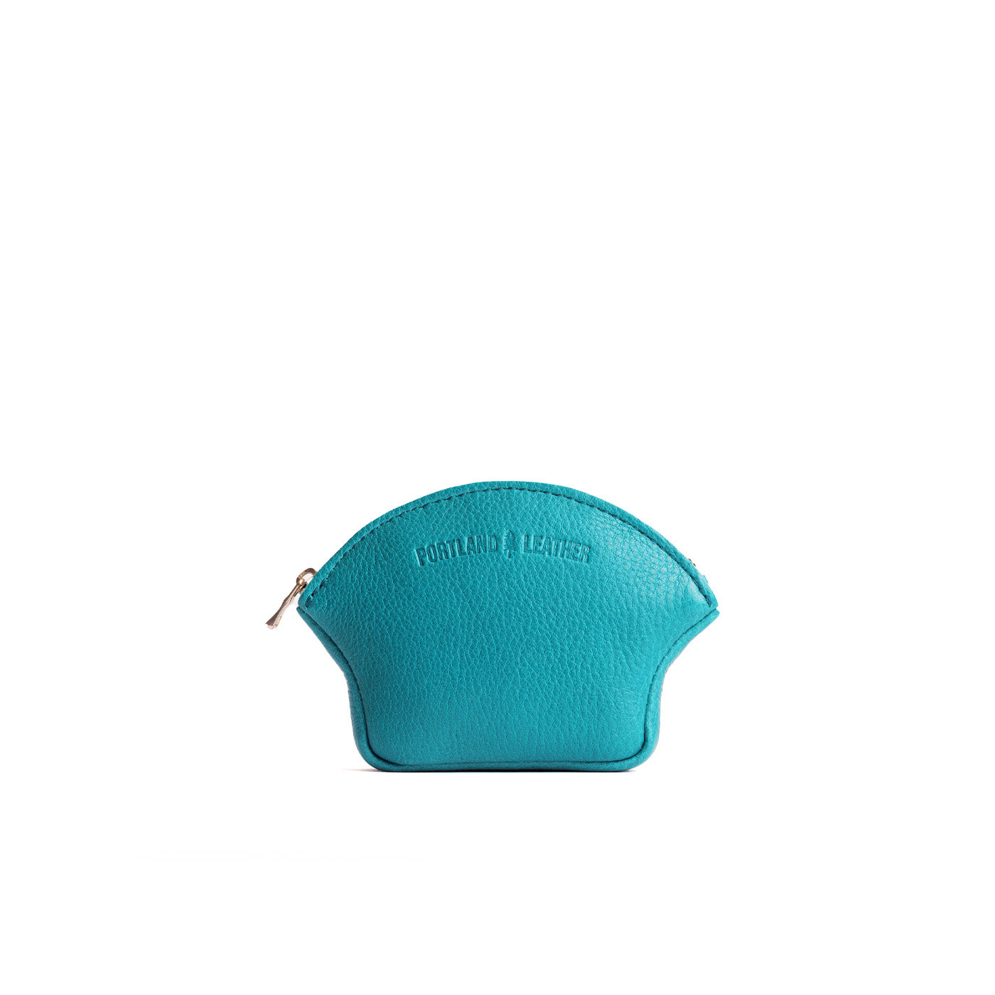 Baja*Small | Seashell shaped leather makeup bag with curved top zipper and flat bottom