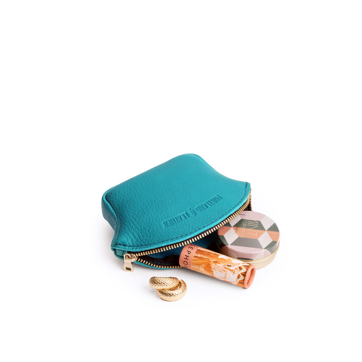 Baja*Small | Seashell shaped leather makeup bag with curved top zipper open and flat bottom