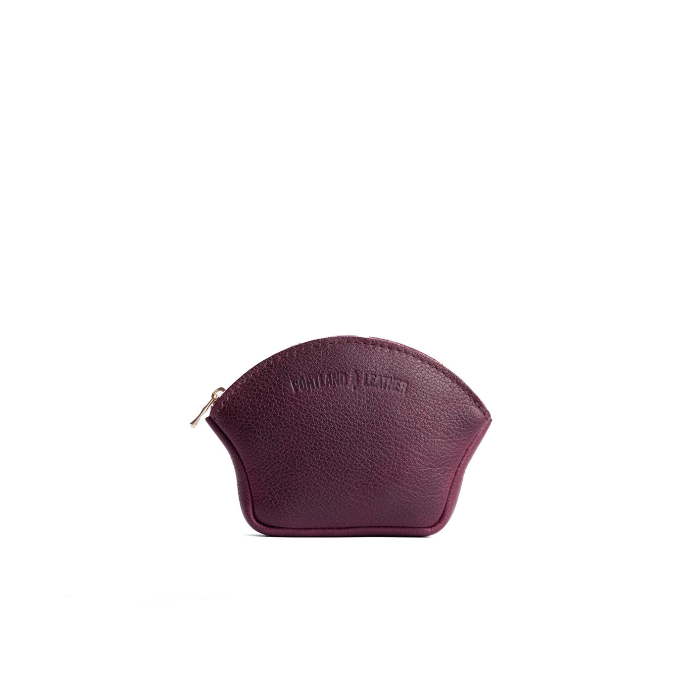 Plum Small | Seashell shaped leather makeup bag with curved top zipper and flat bottom