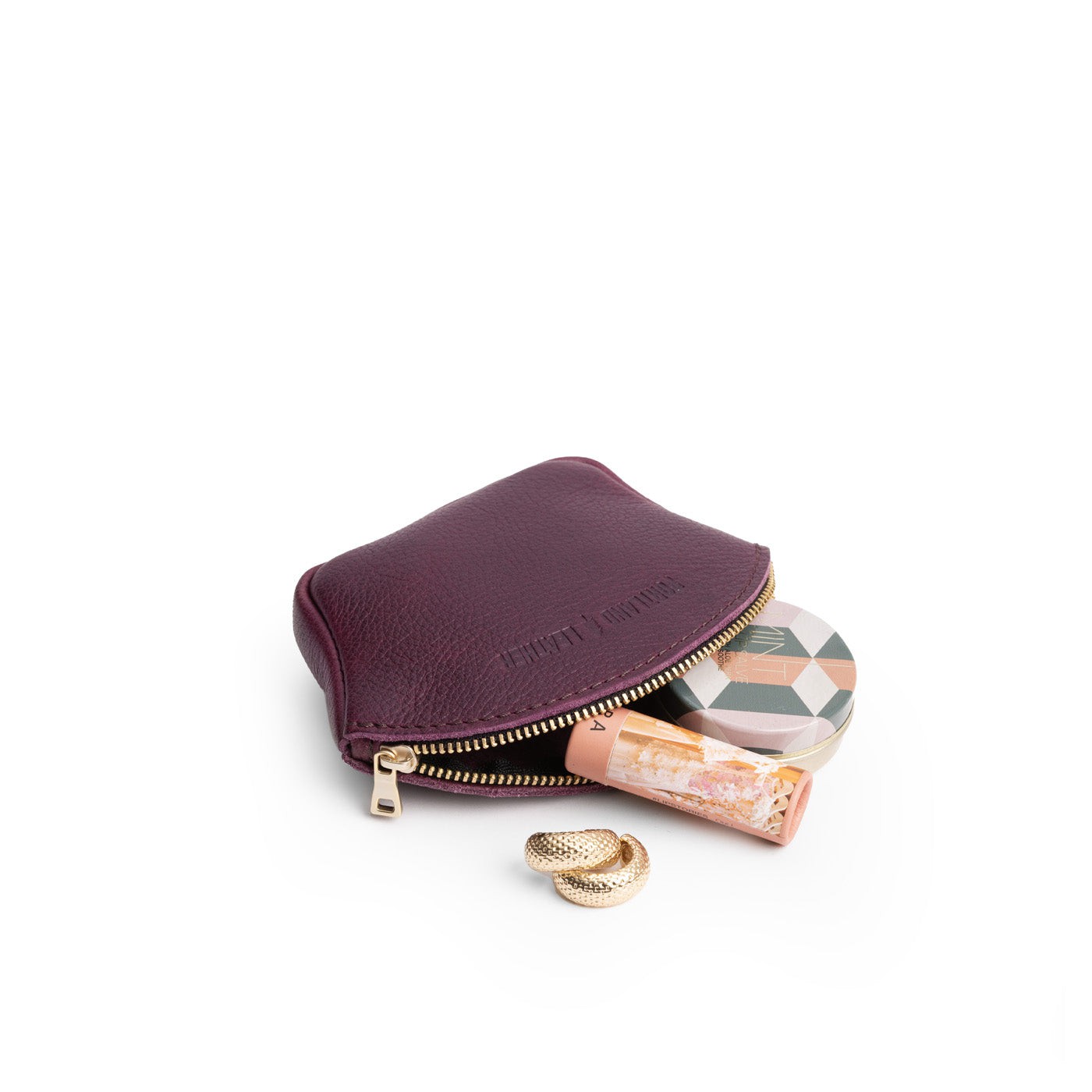 Plum*Small | Seashell shaped leather makeup bag with curved top zipper open and flat bottom