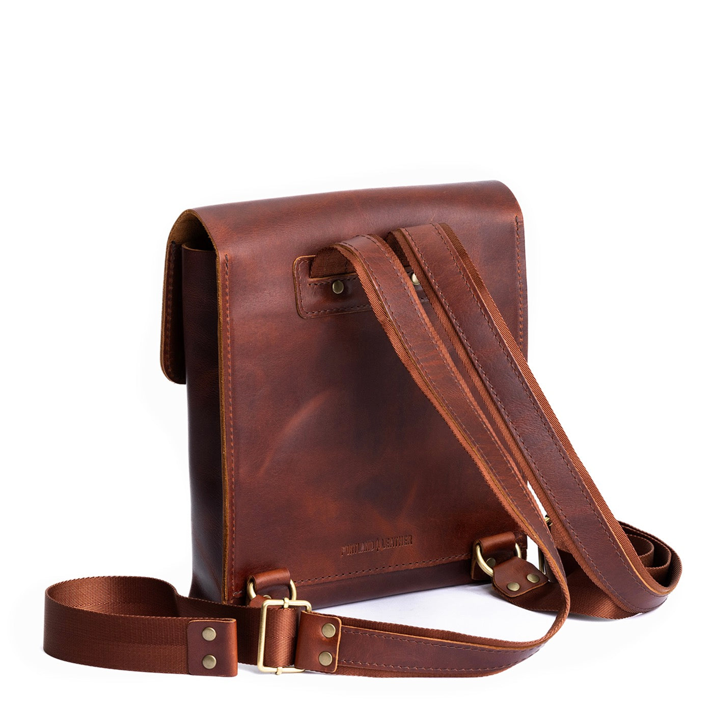 Timber | Rectangular backpack with leather lined nylon straps and magnetic flap closure